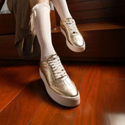 Stellar Nexus 9 pm Gold Sneakers